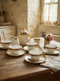Service à thé ancien en porcelaine de Limoges – Liseré jaune et bouquets de roses