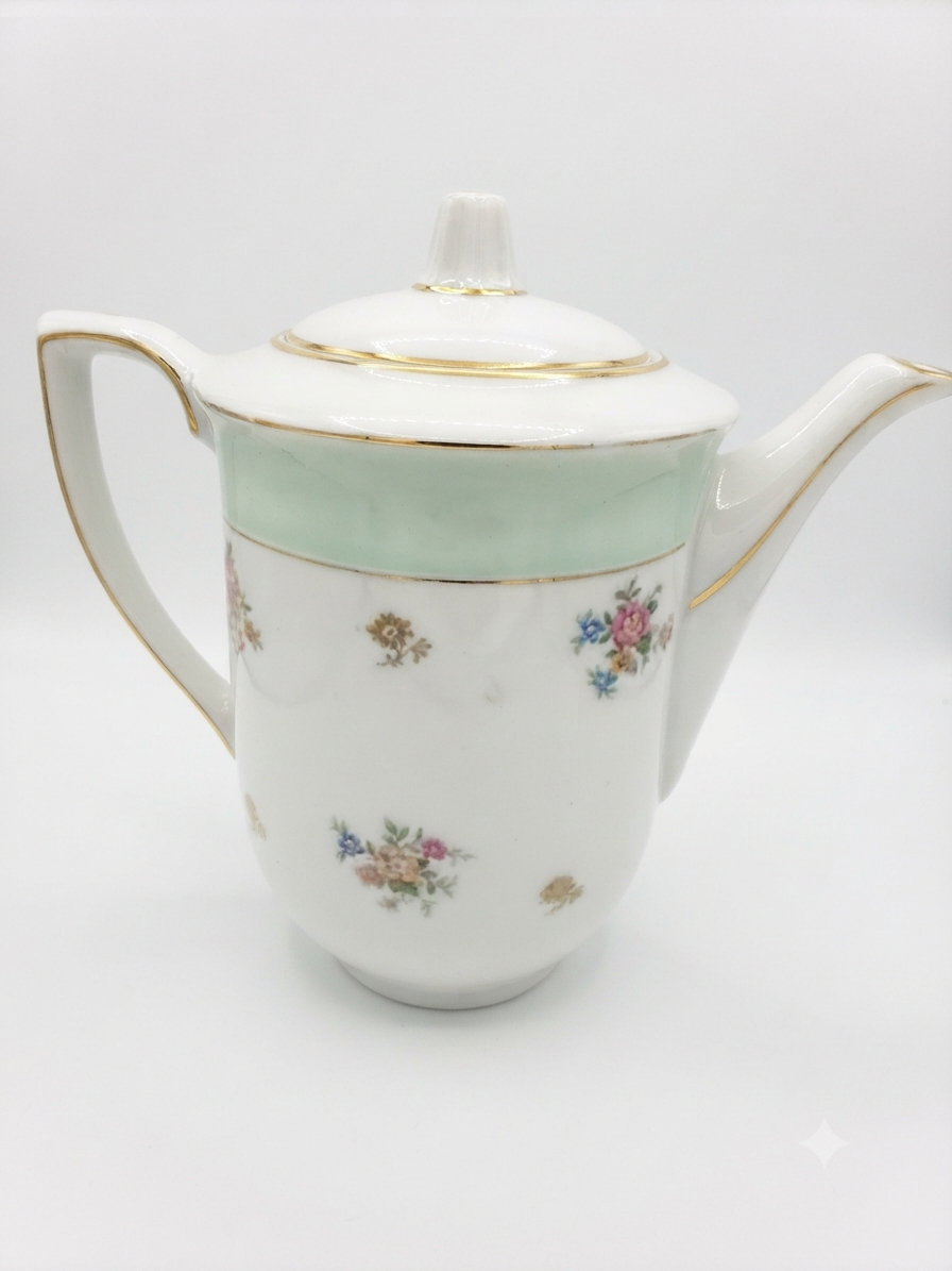 Charmante théière vintage en porcelaine opaque au décor floral et vert menthe